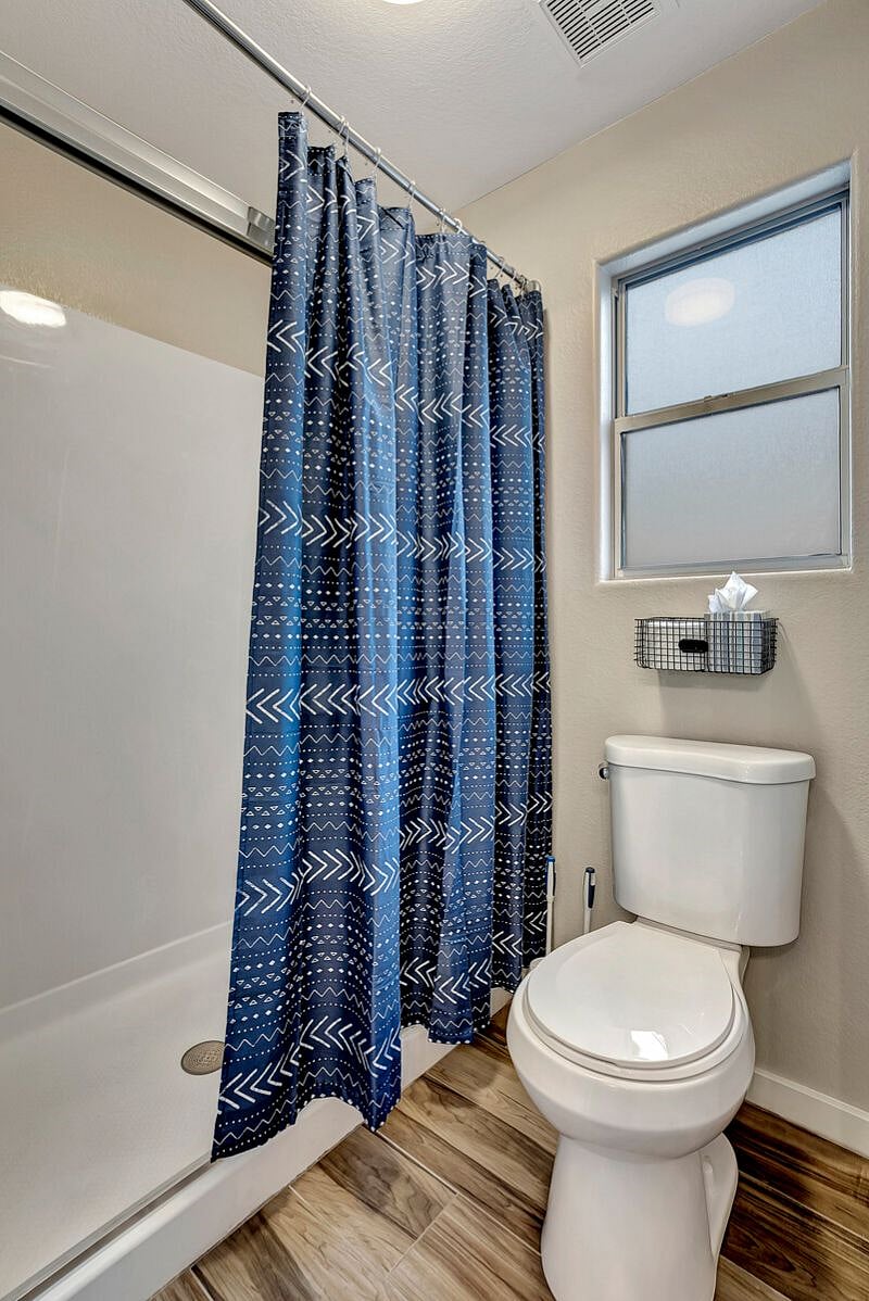 Ensuite off King Bedroom features double sinks, soaking tub, walk-in shower.