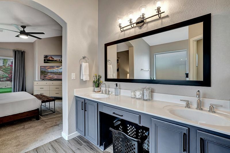Ensuite off King Bedroom features double sinks, soaking tub, walk-in shower.