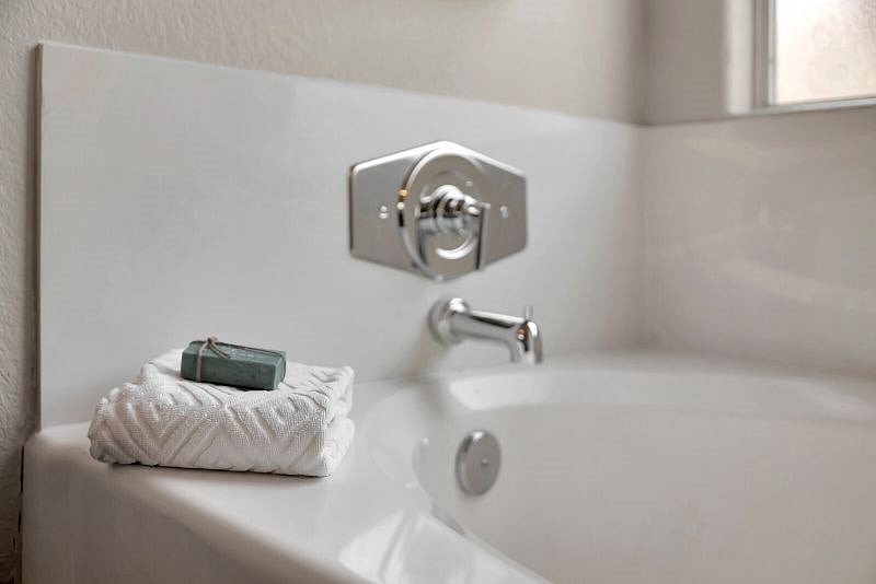 Ensuite off King Bedroom features double sinks, soaking tub, walk-in shower.