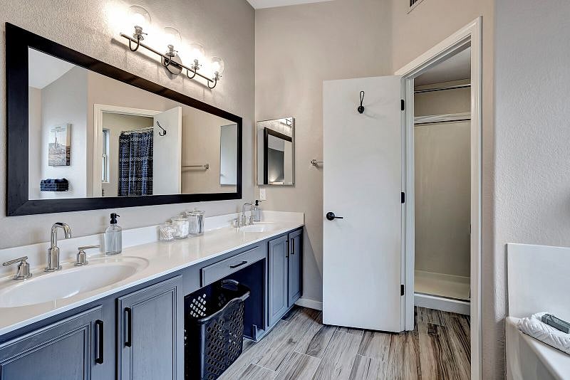 Ensuite off King Bedroom features double sinks, soaking tub, walk-in shower.