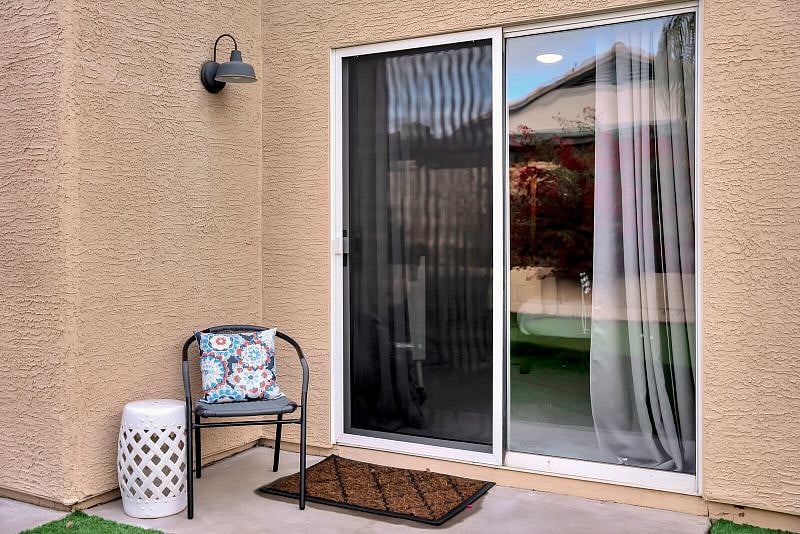 Patio off the king room leads to the backyard