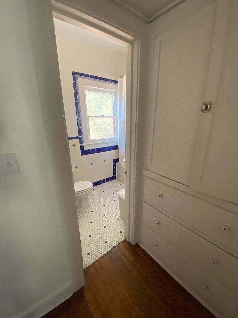 linen cupboard outside bathroom