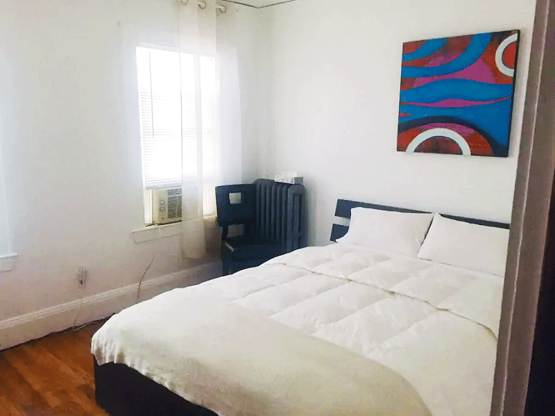 Master bedroom with closet and TV