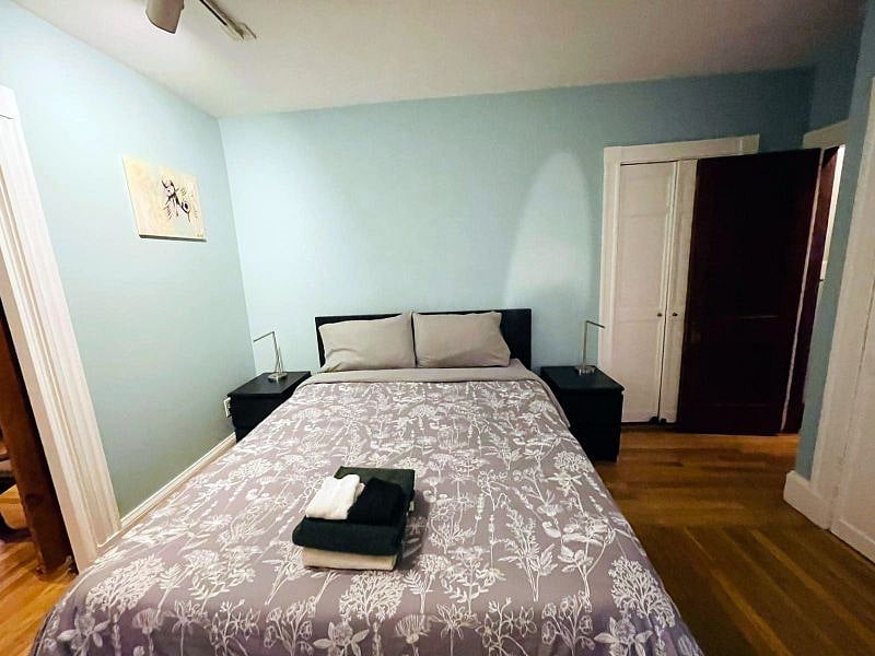 Master bedroom connected with a small bedroom by a sliding door