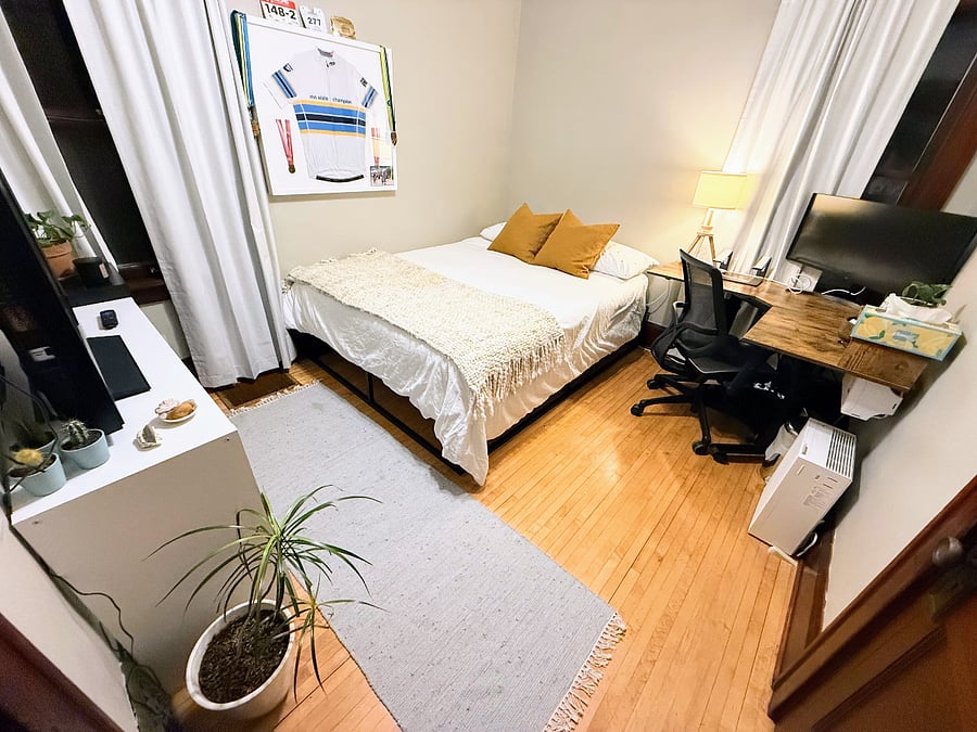 Main floor guest room with home office and queen-sized bed