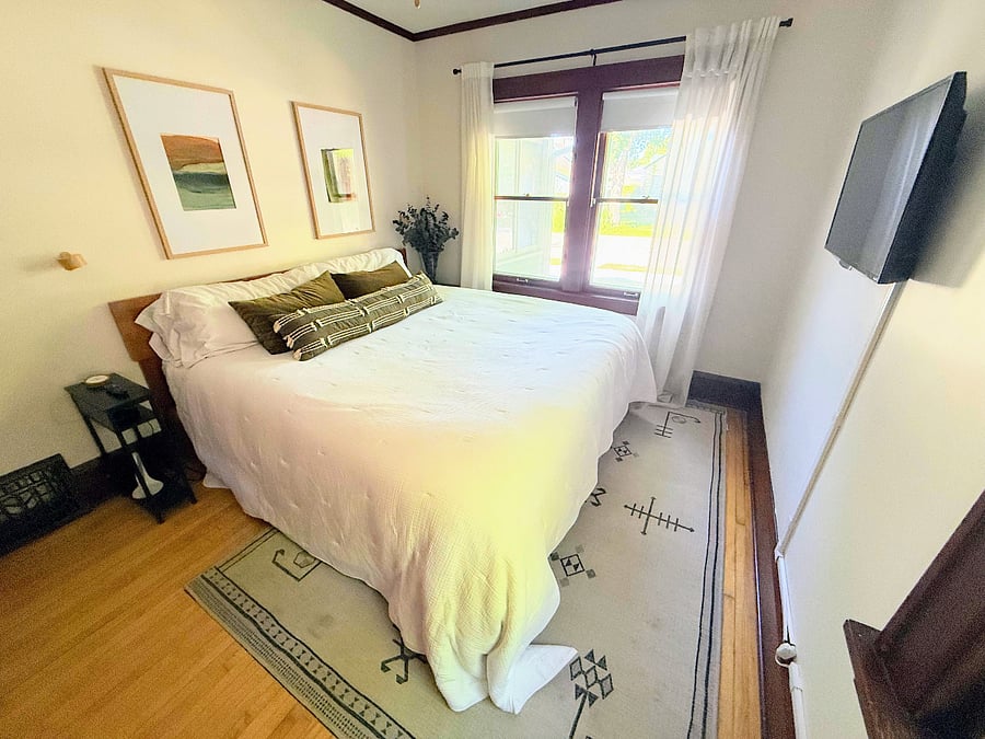 Main floor bedroom with king-sized bed