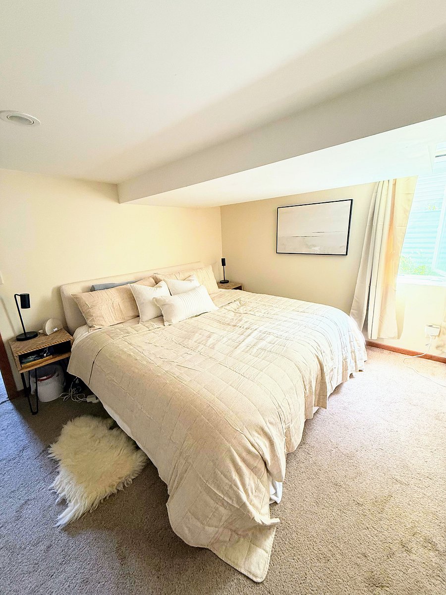 Lower level bedroom with king-sized bed.