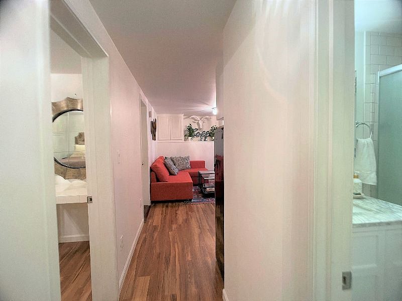 Hall between living room and bathroom