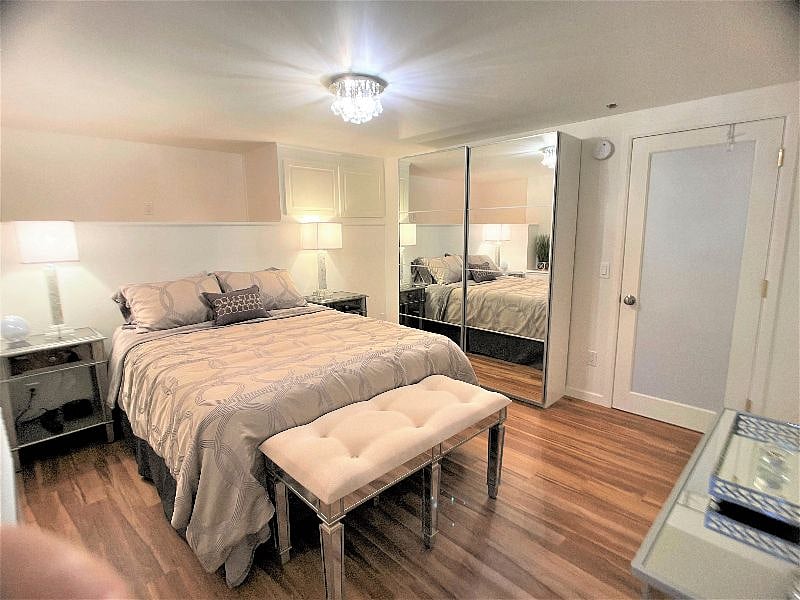 Bedroom 1 (Queen-size bed): facing door. (Same Room as previous room with different quilt)