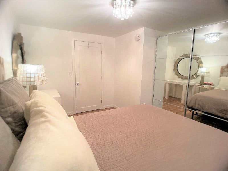 Bedroom 2 (Full-size bed): facing door.