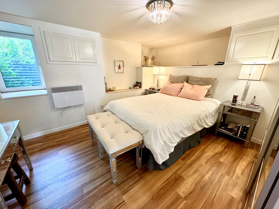 Bedroom 1 (Queen-size bed): direction as coming in from door. European tilt windows that can be opened safely while sleeping, dimmer lighting.
