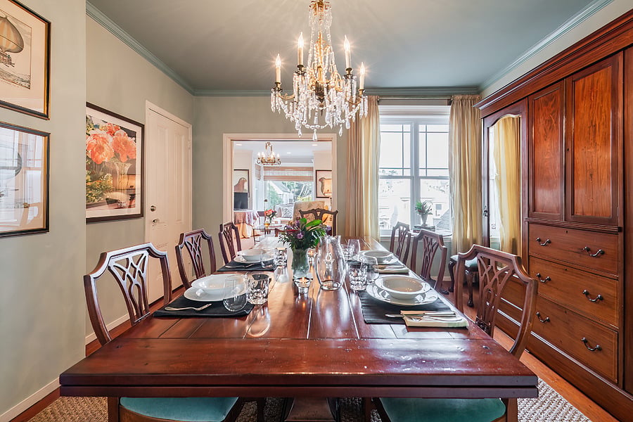 Lovely artwork in the dining room to enjoy and a beautiful french chandelier.