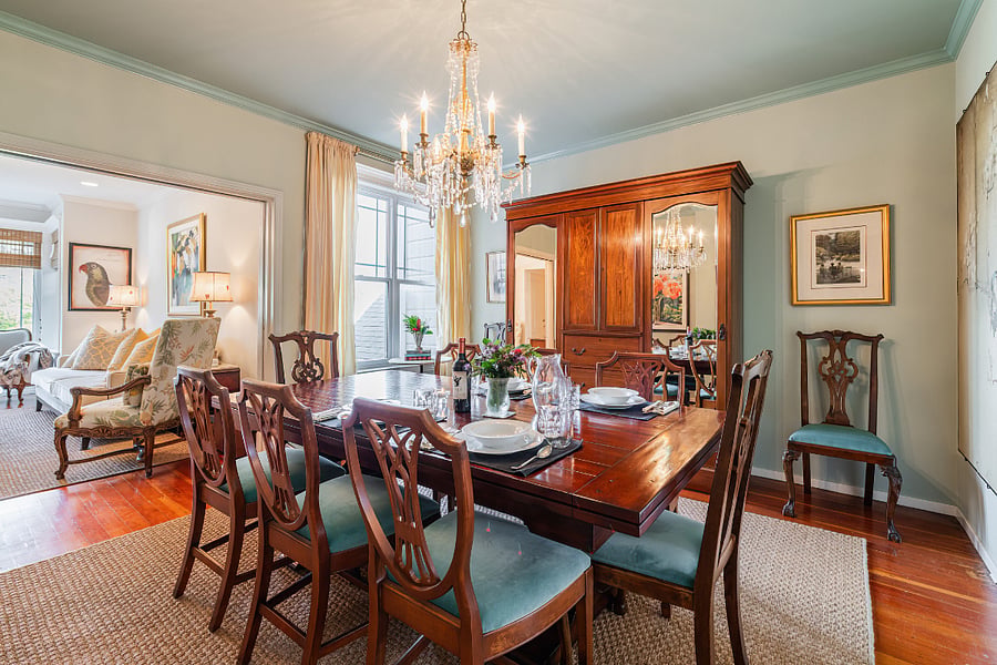 Beautifully appointed dining room adjoining the living room. Great neighborhood views from these windows too.