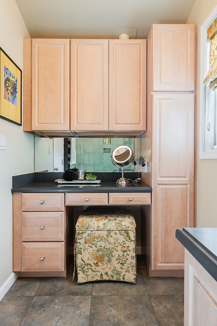 Vanity area for make-up. Lots of cabinets too.