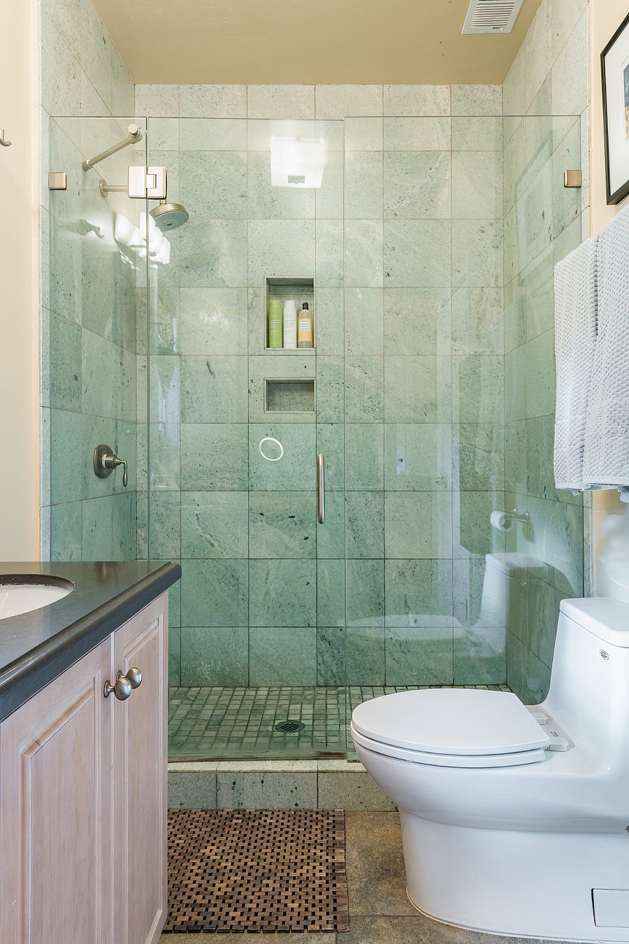 Updated and spacious bathroom with large walk in shower.