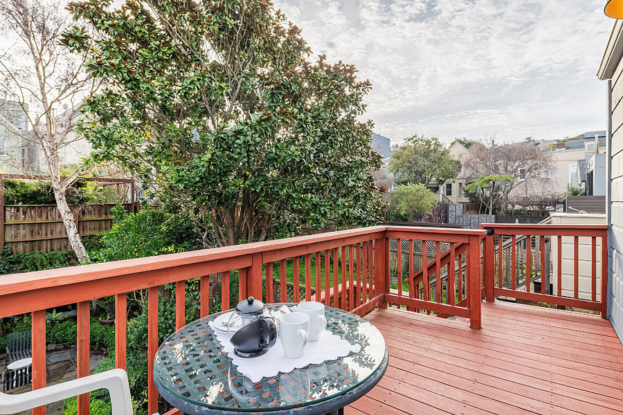 Private deck for upstairs unit. Enjoy morning breakfast or a glass of wine and dinner on the deck.