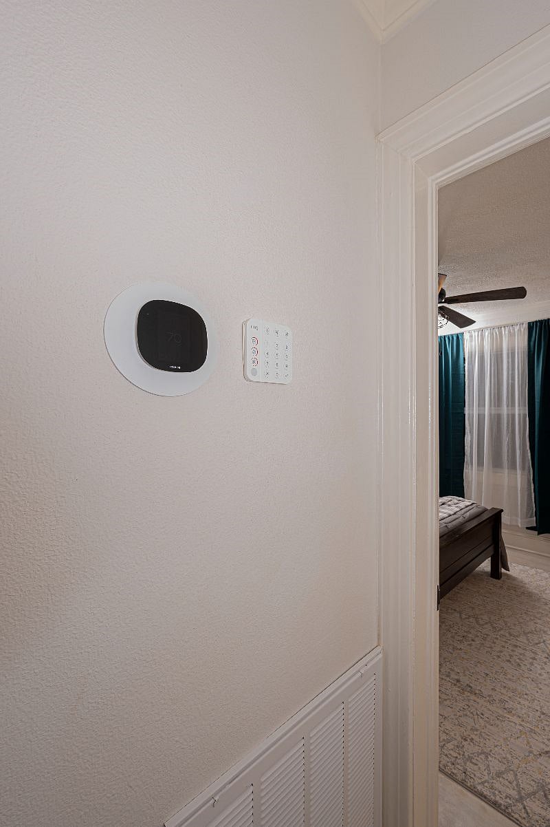 Hallway to the half bath, and small and medium bedrooms. (Hastings 3/2.5)
