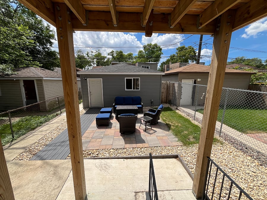 Shared backyard patio area.