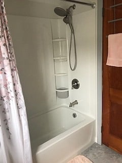Full size tub and shower. 