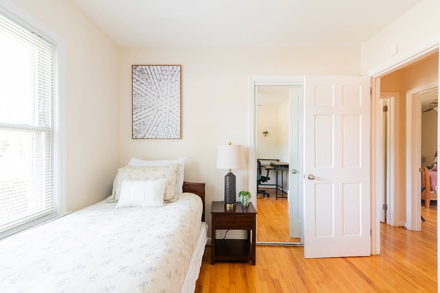 Twin bedroom with large desk