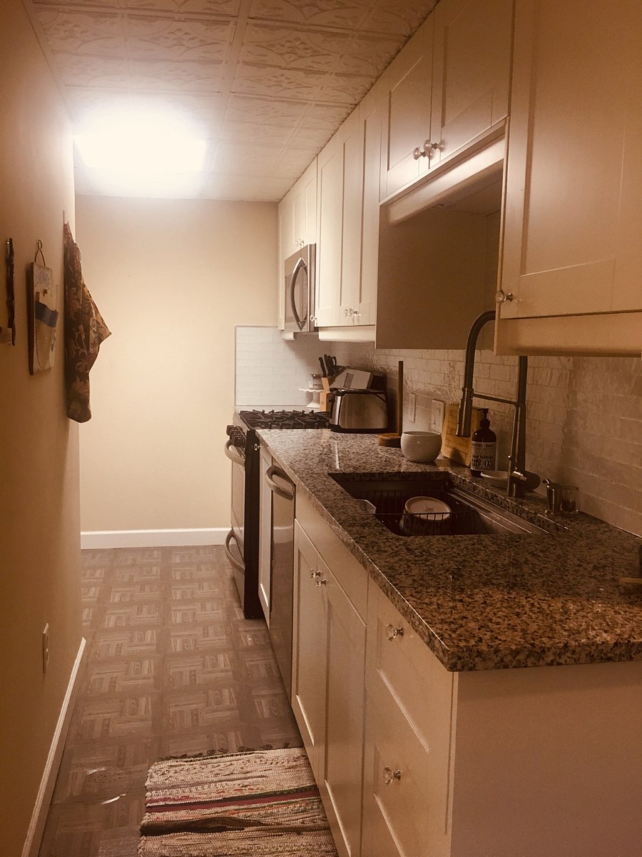 Entrance to kitchen, more pics coming of HUGE fridge and wine/coffee corner and pull out trash and recycle cans. 
