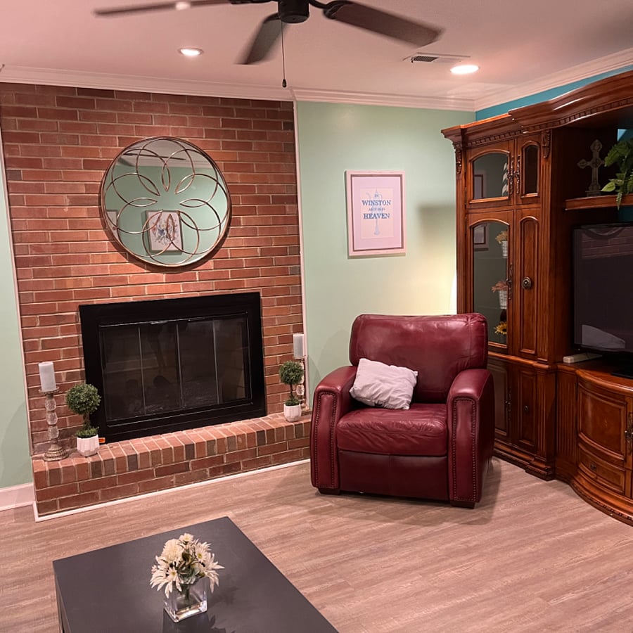 Den with fireplace, large streaming TV