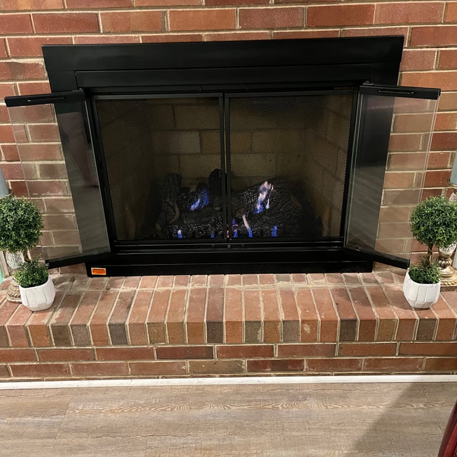 Remote control gas logs