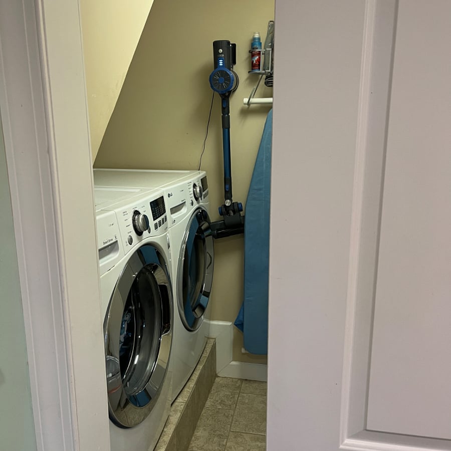 Shared laundry room, ironing board, vacuum