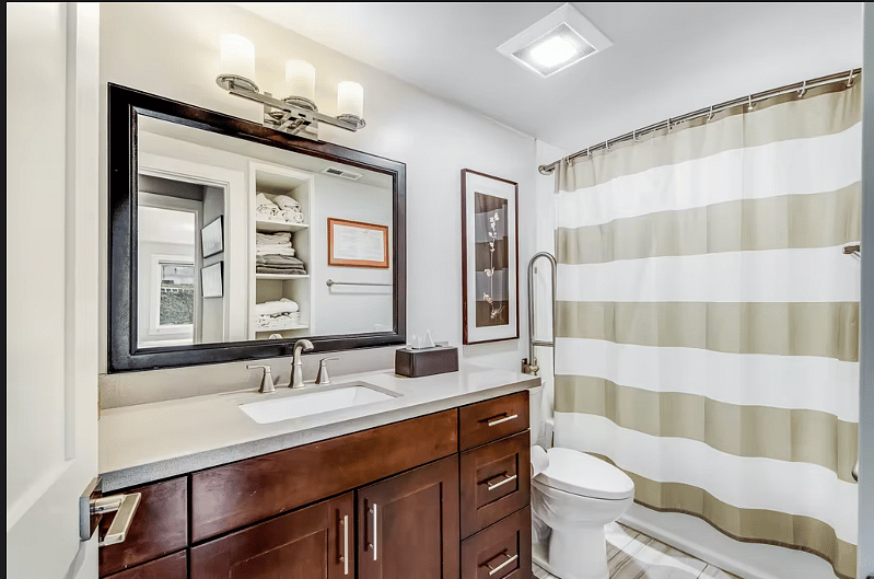 Second bathroom features a shower and bathtub