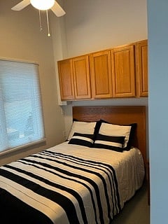Bedroom with Closet and Storage Cabinets