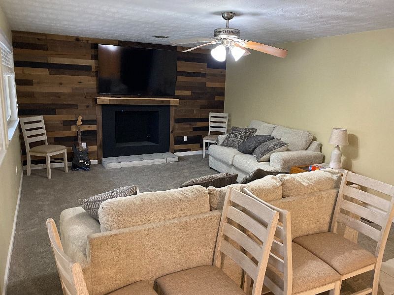 FAMILY ROOM WITH ALL NEW COUCH & LOVE SEAT, FIREPLACE VIEW