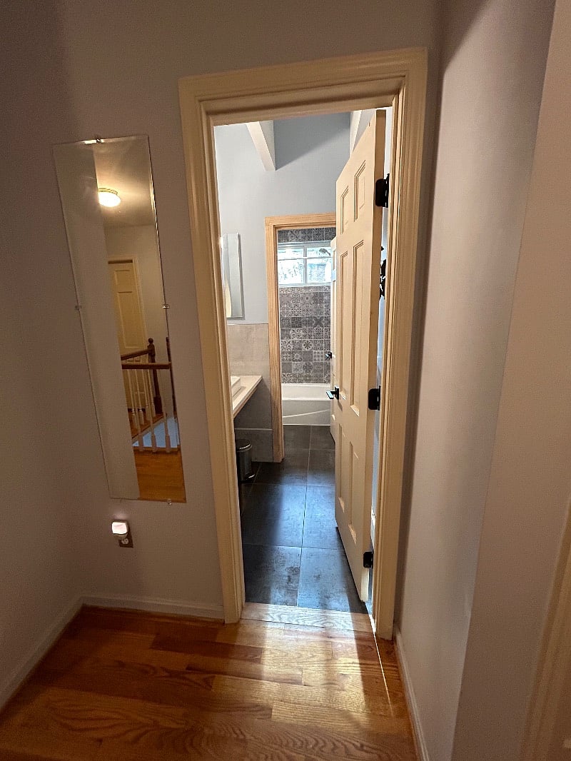 Entrance to shared hall bathroom next to bedroom #2 and across from bedroom #3 - Photo #1