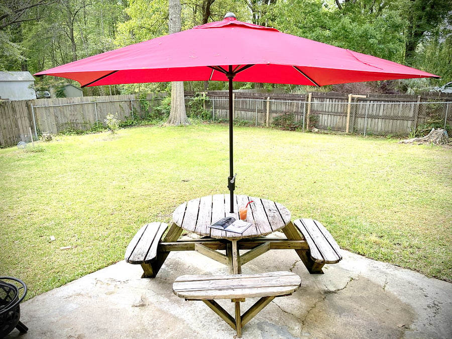 Or Sit under the umbrella on the back porch patio.