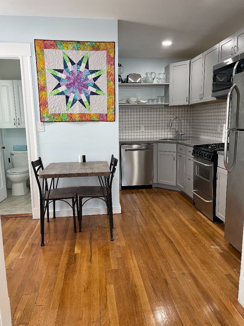 Full kitchen including dish washer, stove, refrigerator, microwave.