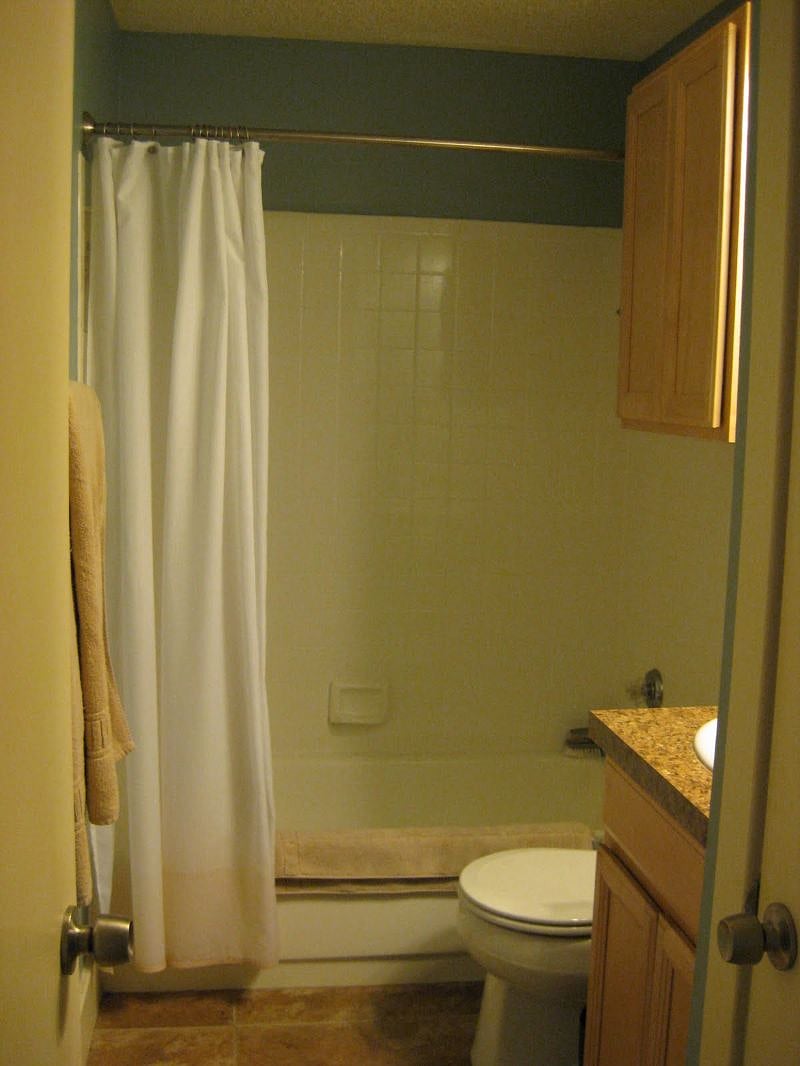 Bathroom with full tub and shower.