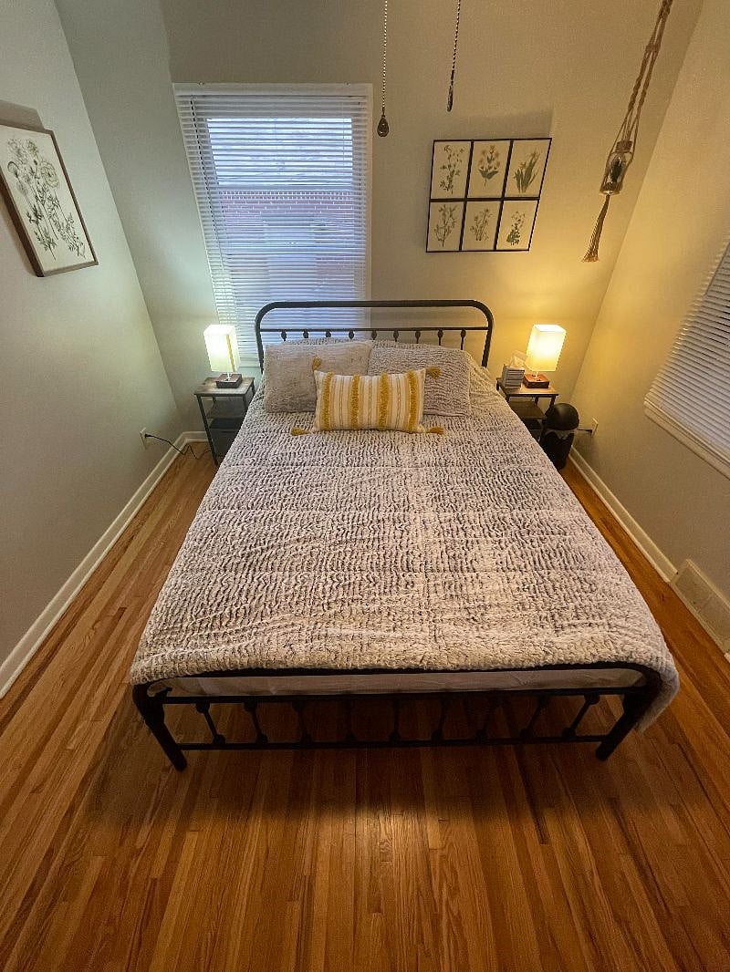 Master bedroom with queen bed and desk office space