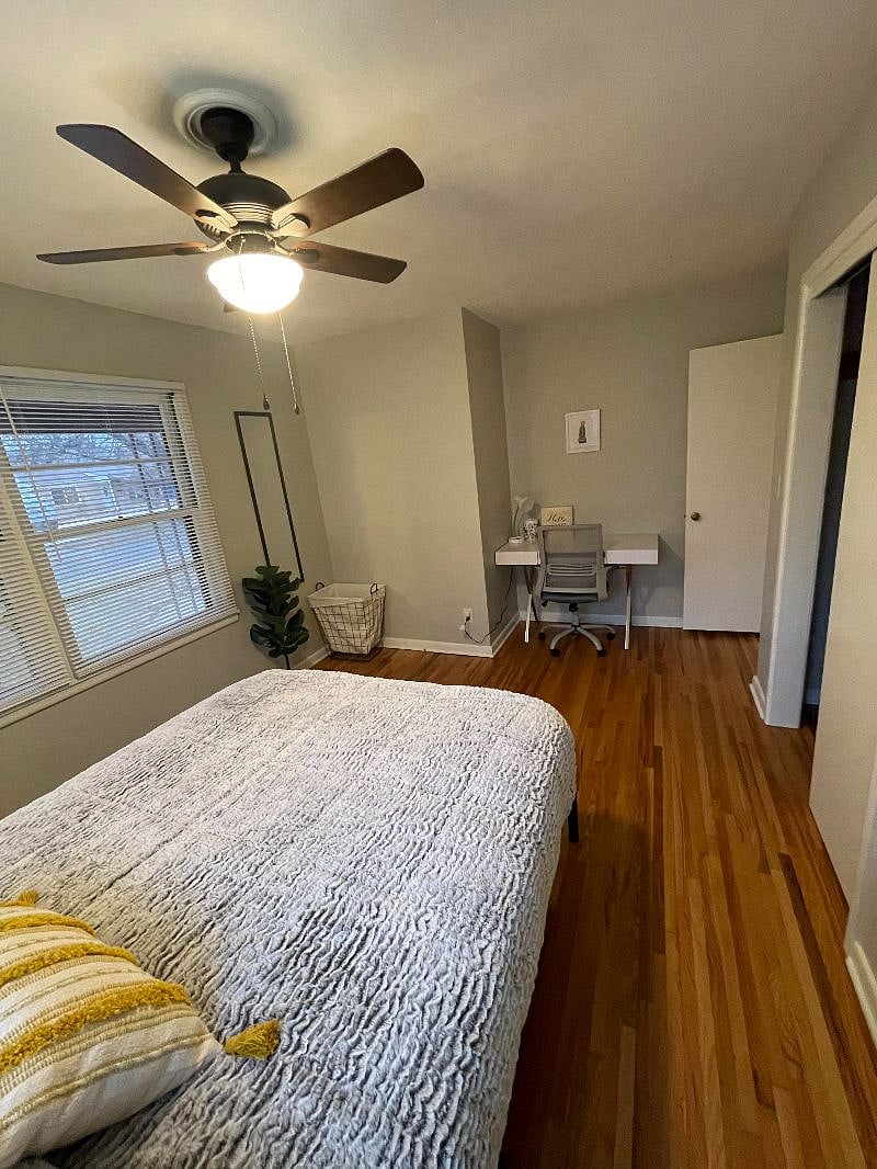 Master bedroom with queen bed and desk office space