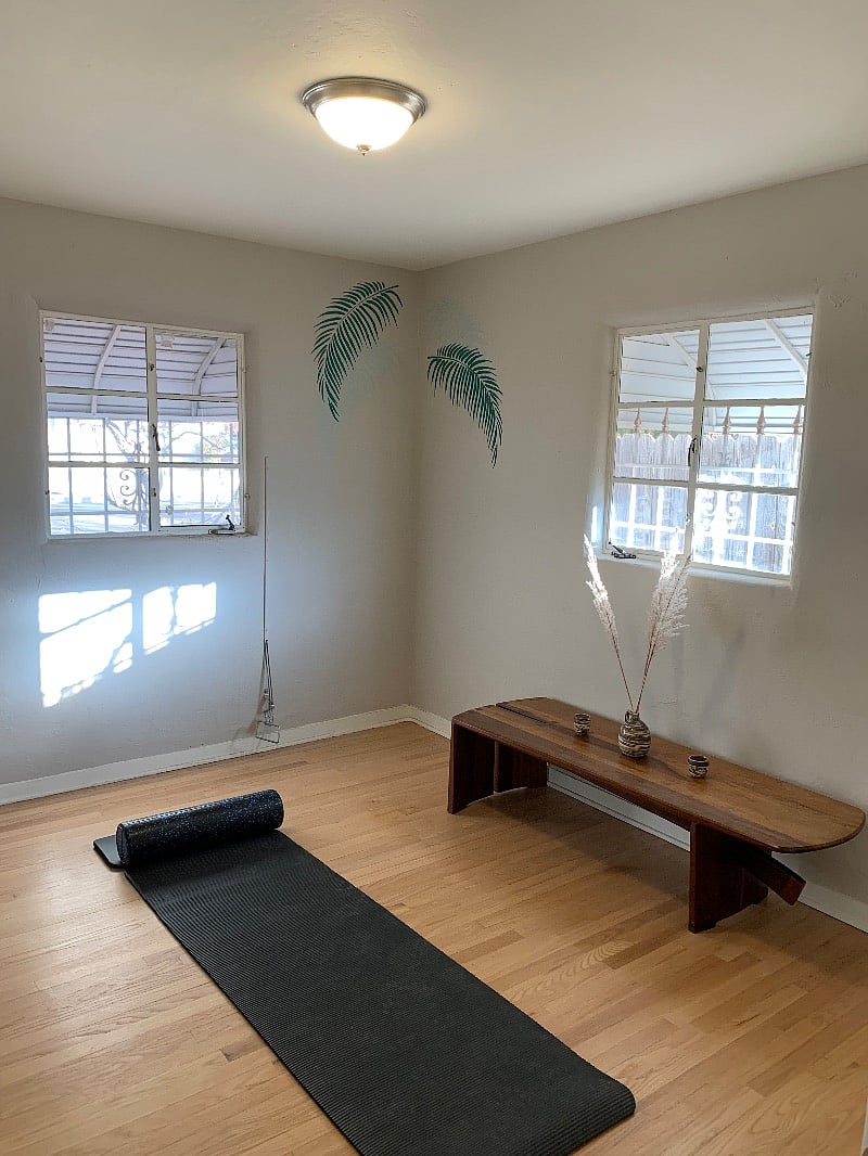 3rd bedroom currently as yoga/workout room includes full size air mattress and blankets. Large mirror on left wall just out of view.
