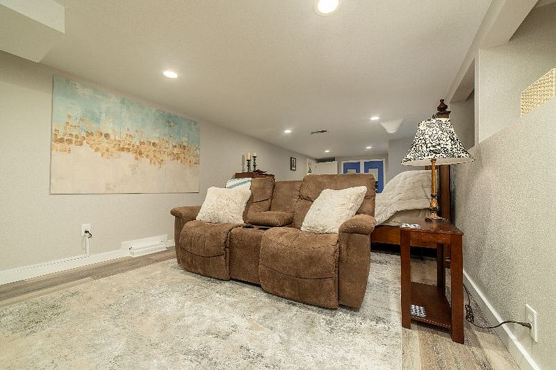 Double recliner with storage and cup holders. Perfect for movie time!