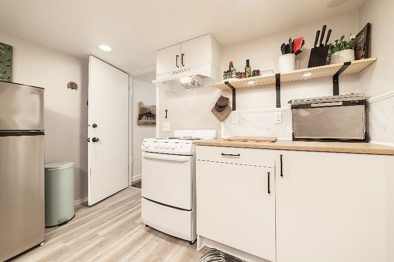 Stove with oven and refrigerator