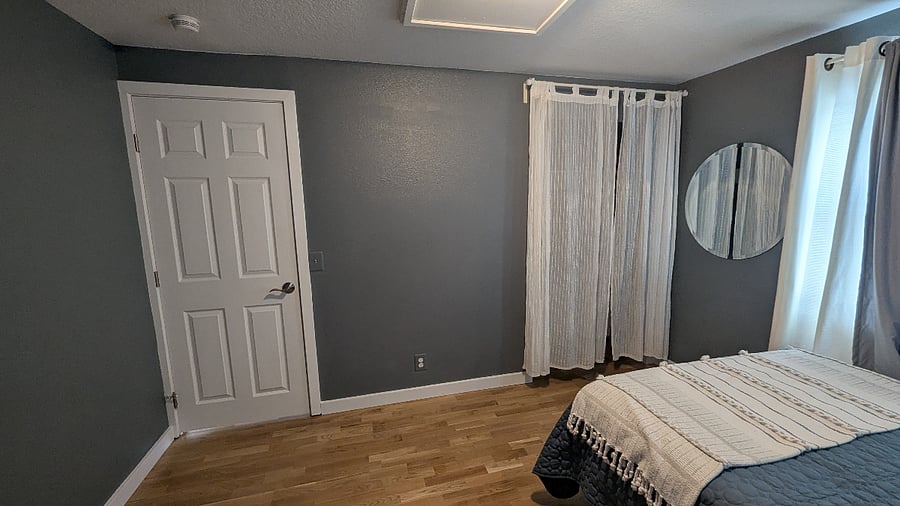 Closet has hangers and extra linens.