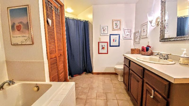 Large bathroom with soaking tub and separate shower