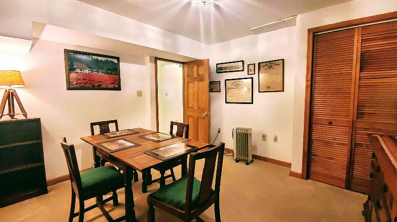 Spare room for dining, office, working out. (Not a bedroom, though.) Extra storage in dresser and closet.