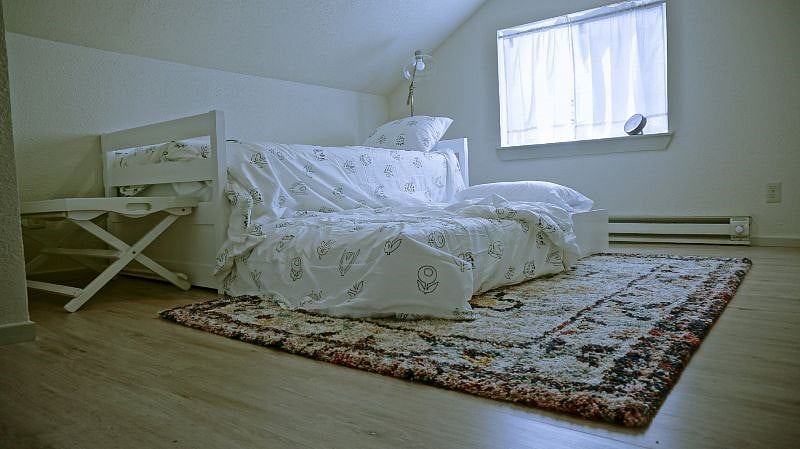 Upstairs bedroom with TV.