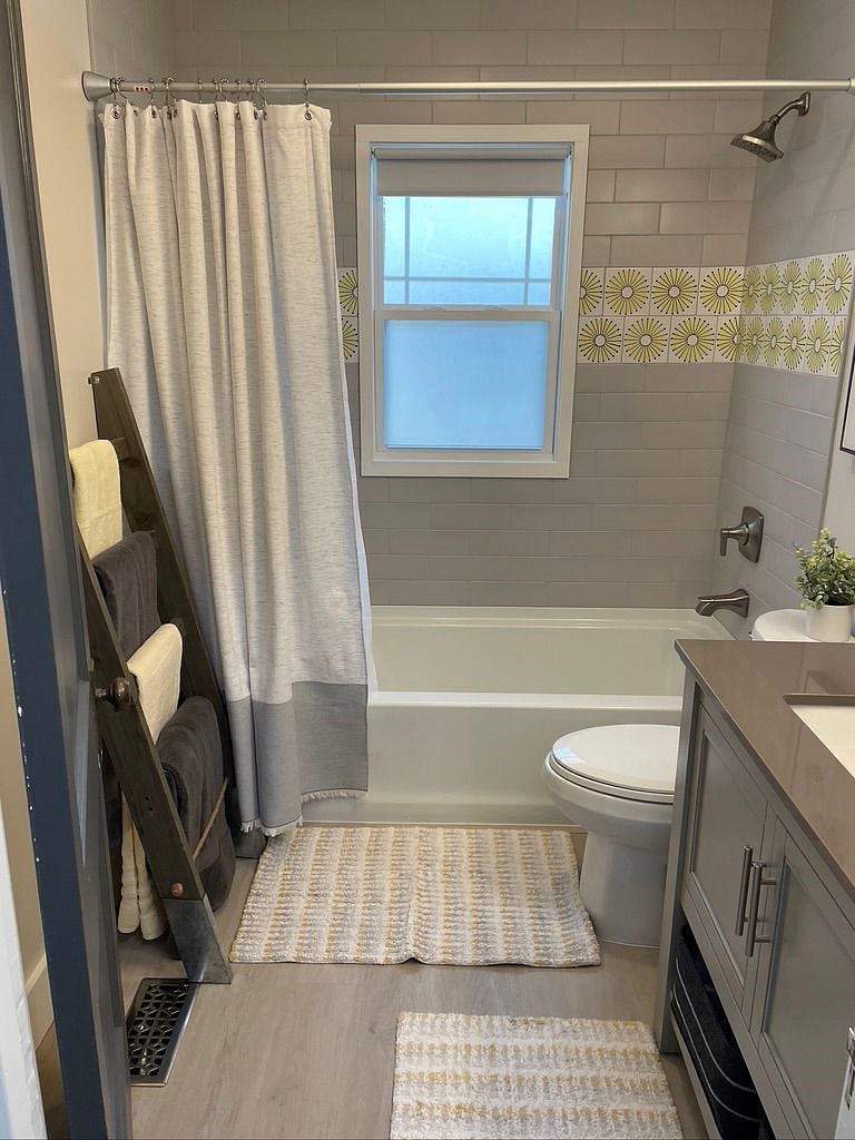 Brand new bathroom with tiled tub/shower