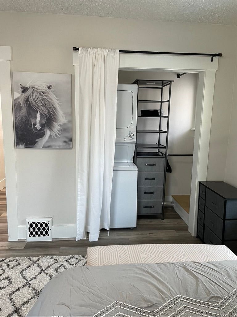 Bedroom 2 closet with full size washer/dryer inside