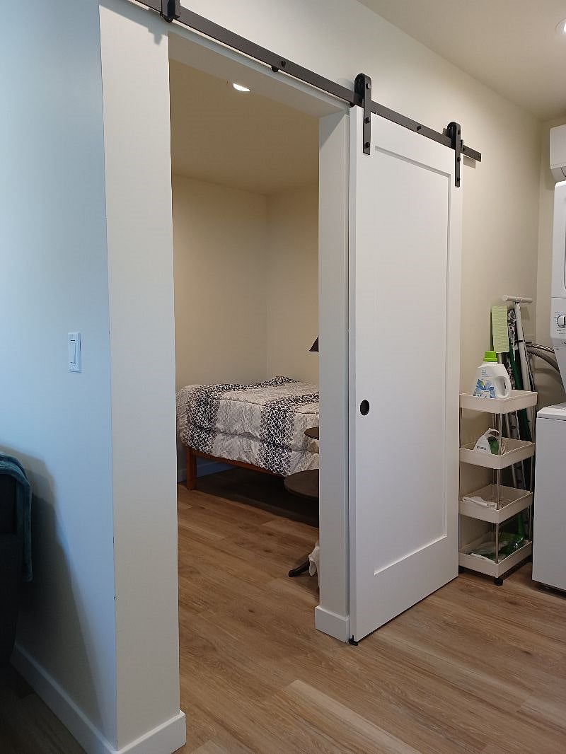 twin size bed and barn door closure