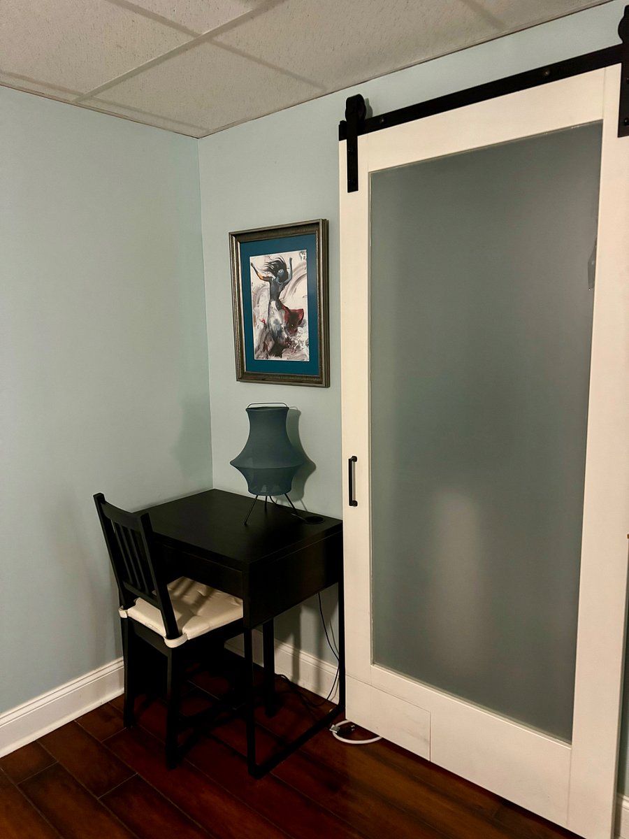 Dress in bedroom and door to laundry room