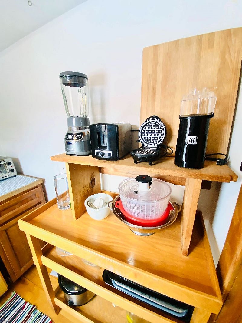 All the basic kitchen appliances, plus some fun extras! Popcorn machine, mini waffles, crock pot, toaster and toaster oven, etc.