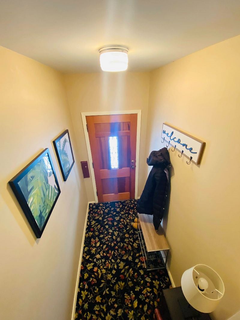 Private entrance with keypad smart lock and jacket/shoe storage